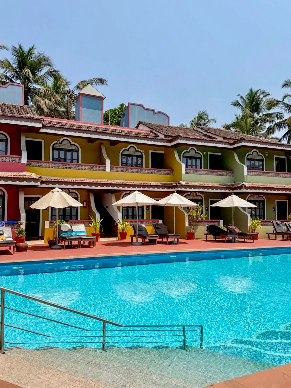Skylark Resort pool with the colourful guest building behind